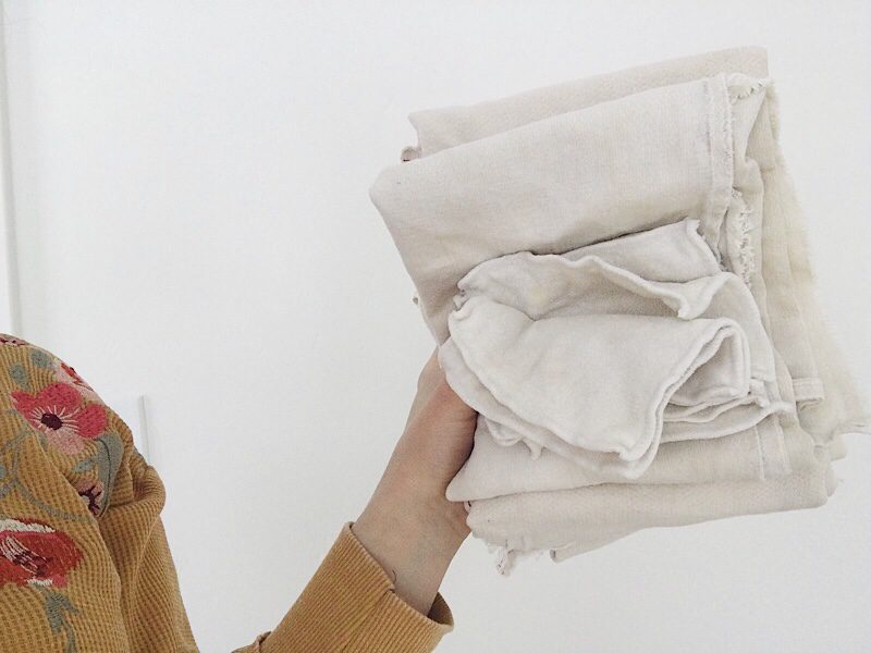 woman holding cloth diapers