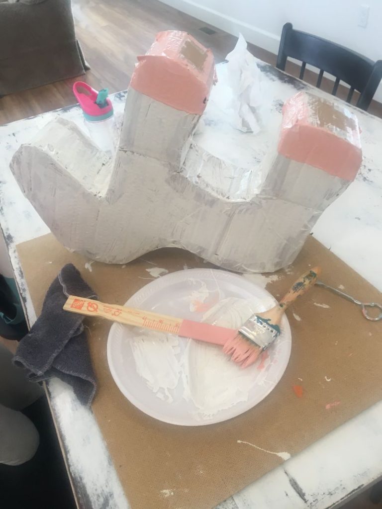 painting the unicorn pinata