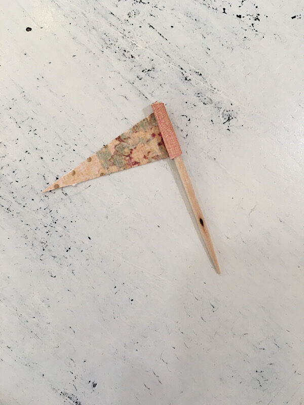 wrapping paper around toothpick