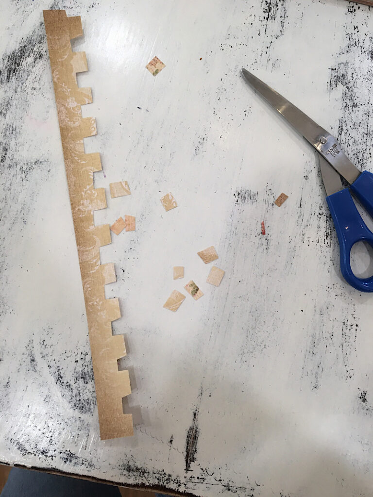 cut out the brick pattern from the paper