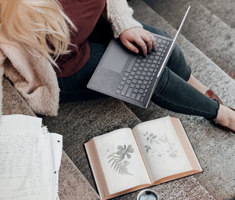 mom on laptop writing