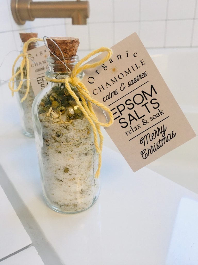 Chamomile herb in glass bottles jars bath salts